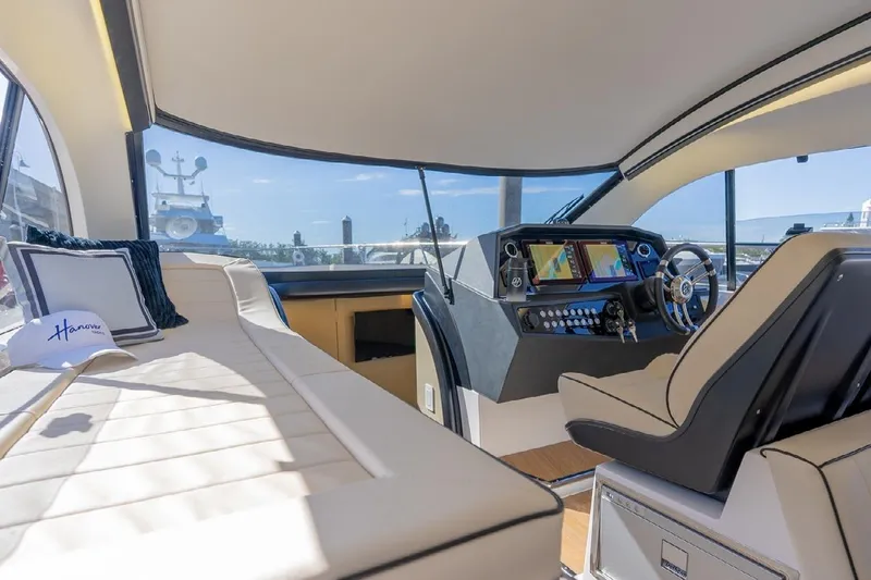 Slide: The Image of Luxurious interior of 2024 Hanover 415 Pure Gray yacht with modern helm and seating. - 10