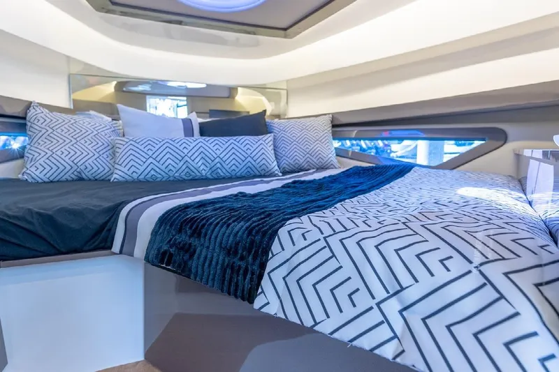 Slide: The Image of Luxurious interior of 2024 Hanover 415 Pure Gray yacht with modern bedding design. - 16