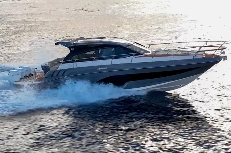 Slide: The Image of 2024 Hanover 415 Pure Gray yacht cruising on open water. - 17