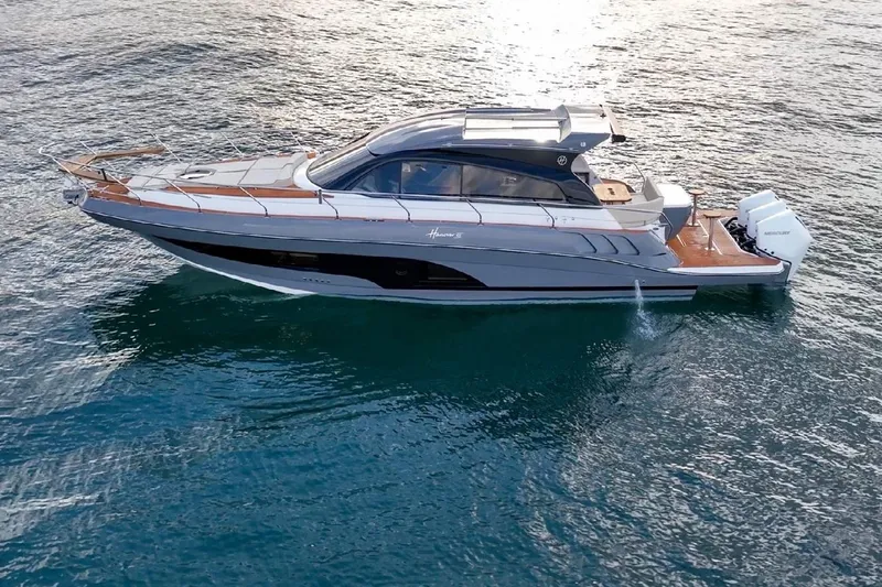 Slide: The Image of 2024 Hanover 415 Pure Gray yacht cruising on open water. - 3