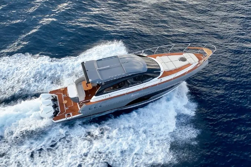 Slide: The Image of 2024 Hanover 415 Pure Gray yacht cruising on open water, aerial view. - 4