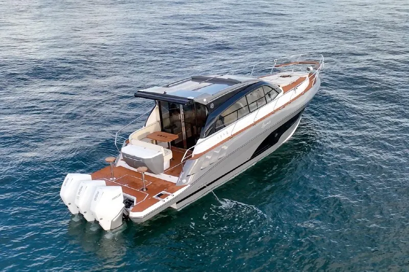 Slide: The Image of 2024 Hanover 415 Pure Gray yacht cruising on open water. - 5