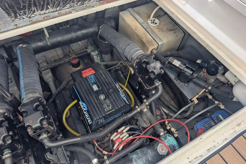Slide: The Image of Engine compartment of a 1996 Sea Ray 330 Sundancer with MerCruiser components. - 27