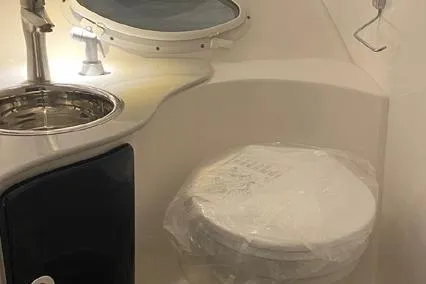 Slide: The Image of 2024 Hanover 305 White & Gray Edition bathroom with sink and toilet, modern design. - 8