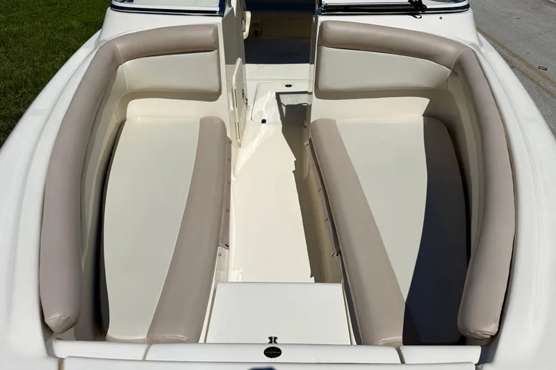 Slide: The Image of 2021 Scout 210 Dorado boat interior with beige seating and spacious layout. - 10