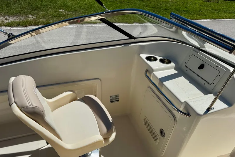 Slide: The Image of Interior of 2021 Scout 210 Dorado boat with seating and cup holders. - 19