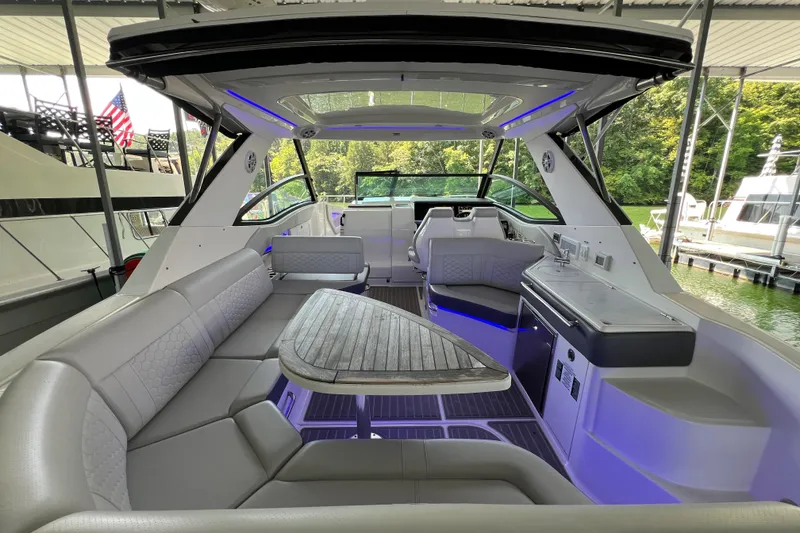 Slide: The Image of 2022 Sea Ray Sundancer 320 Outboard interior with luxurious seating and modern amenities. - 39