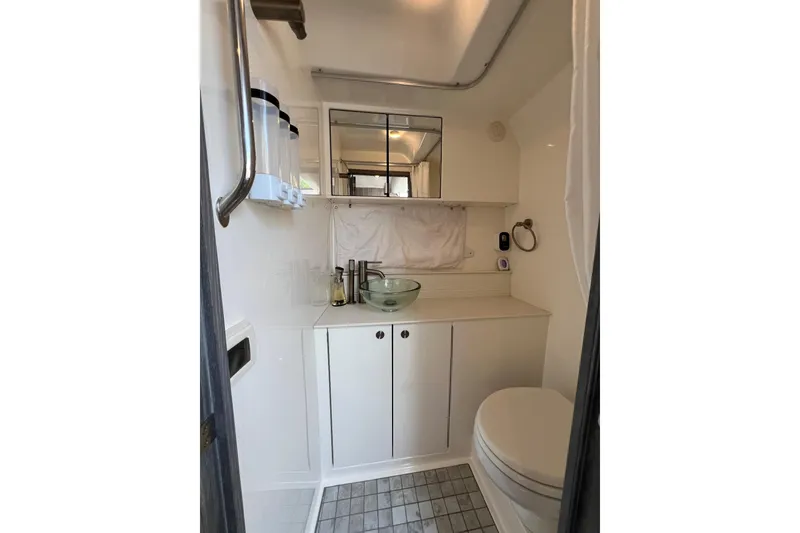 Slide: The Image of 2022 Sea Ray Sundancer 320 Outboard bathroom with modern fixtures and sleek design. - 46