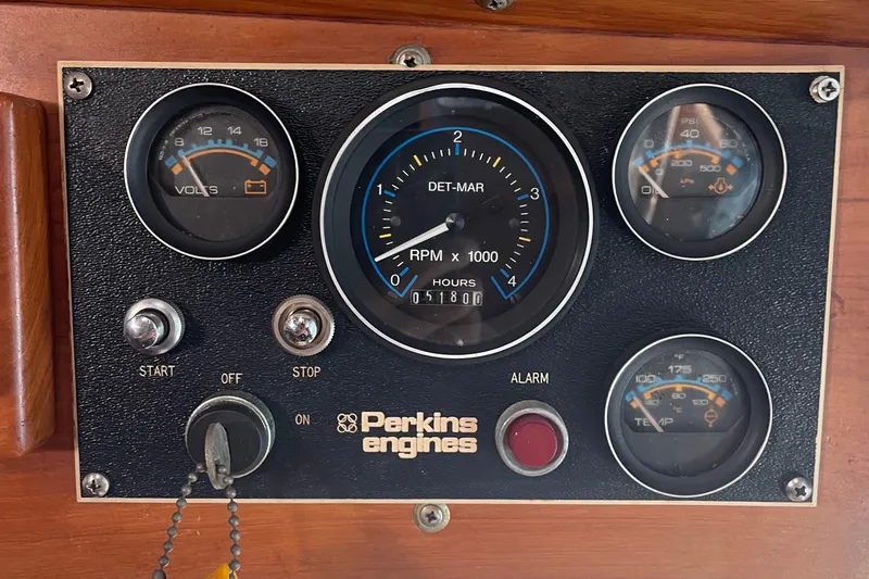 Slide: The Image of Control panel of a 1986 Monk 36 Trawler with Perkins engine gauges. - 8