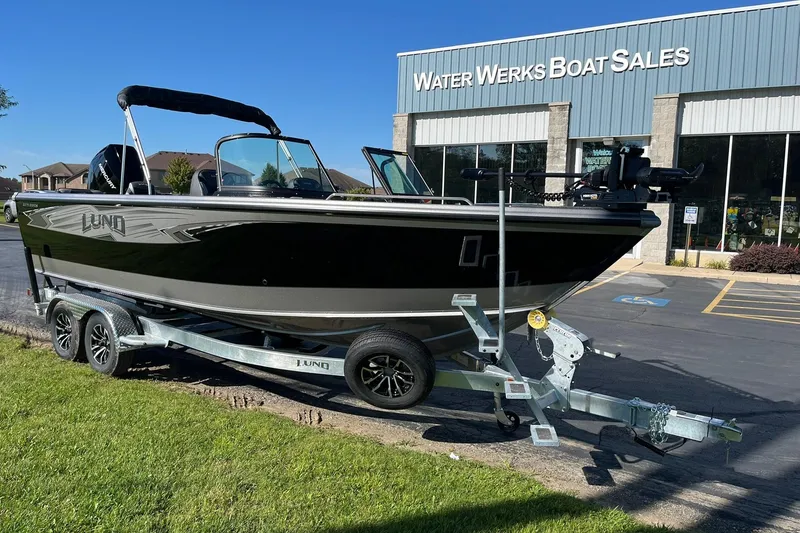 Slide: The Image of 2026 Lund 2275 Baron boat on trailer at Water Werks Boat Sales dealership. - 5