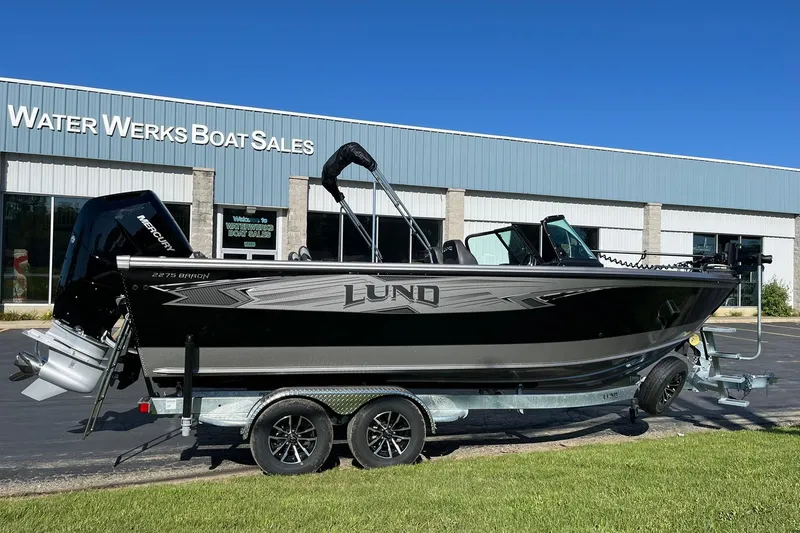 Slide: The Image of 2026 Lund 2275 Baron boat on trailer at Water Werks Boat Sales. - 6