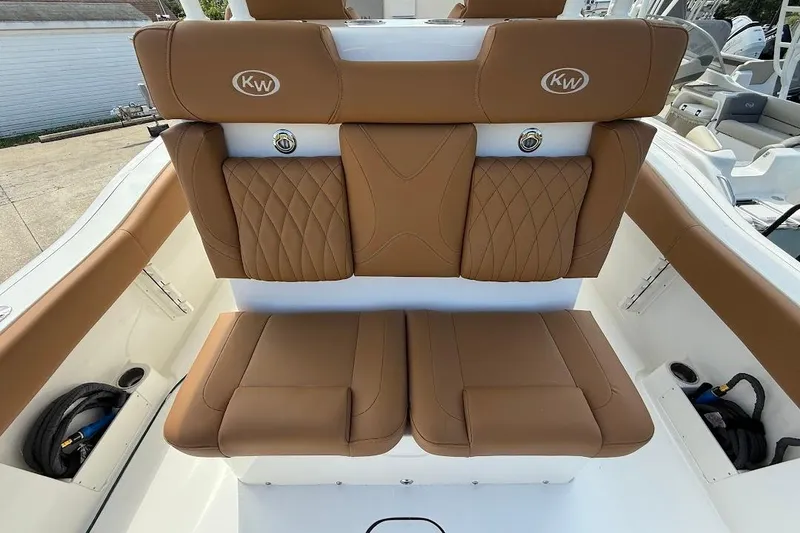 Slide: The Image of 2026 Key West 291 FS boat with tan leather seating and elegant design. - 11