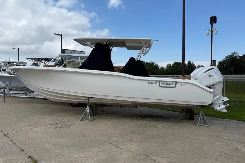 The Image of 2026 Key West 291 FS boat on display, featuring sleek design and powerful engine. - 2