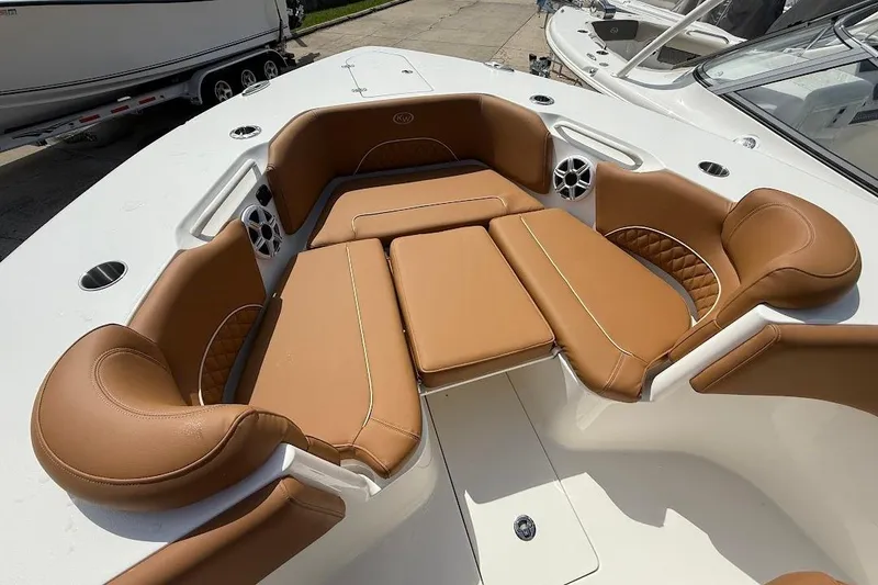Slide: The Image of 2026 Key West 291 FS boat with luxurious tan seating and modern design. - 25