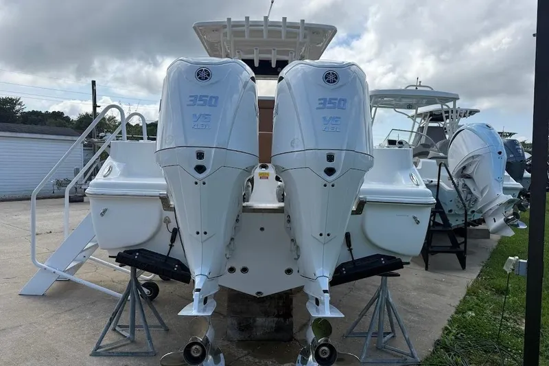 Slide: The Image of 2026 Key West 291 FS boat with dual 350 V6 engines on display. - 5