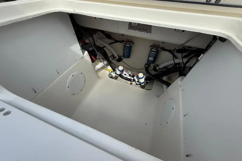Slide: The Image of 2026 Key West 291 FS boat compartment with wiring and components. - 9