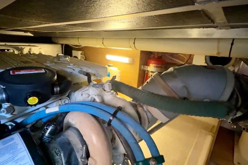 Slide: The Image of Engine room of 2007 Beneteau Swift Trawler 42 with visible pipes and equipment. - 101