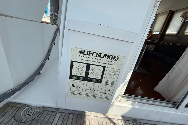 Slide: The Image of Lifesling 3 rescue system on 2007 Beneteau Swift Trawler 42 yacht deck. - 18