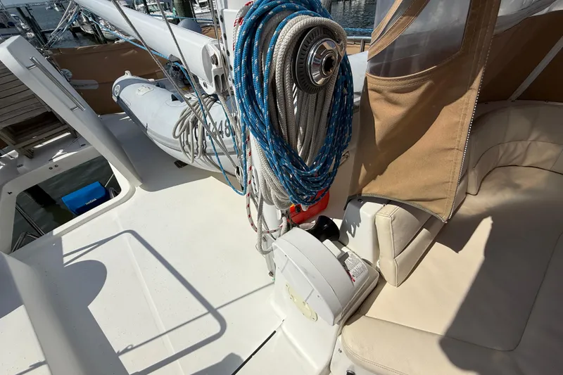 Slide: The Image of 2007 Beneteau Swift Trawler 42 deck with ropes and seating area. - 22