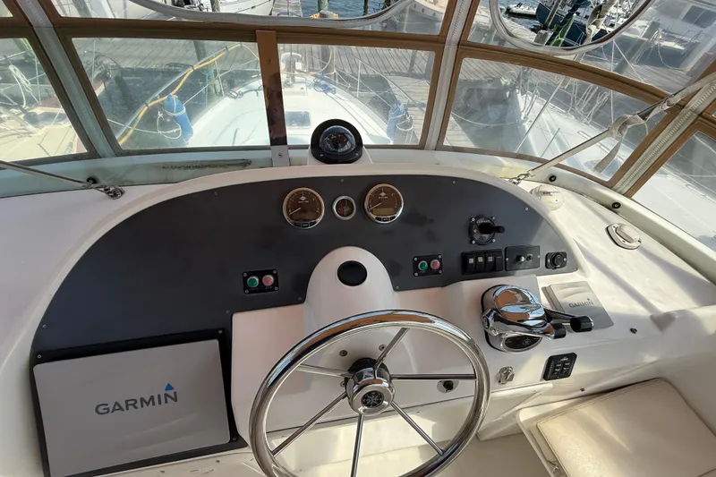 Slide: The Image of Helm of 2007 Beneteau Swift Trawler 42 with Garmin navigation system. - 30