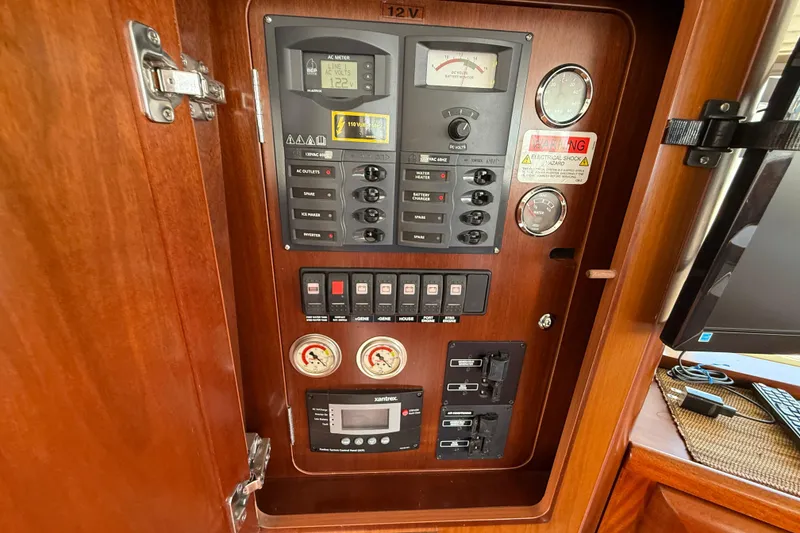 Slide: The Image of Electrical control panel on a 2007 Beneteau Swift Trawler 42 boat. - 42