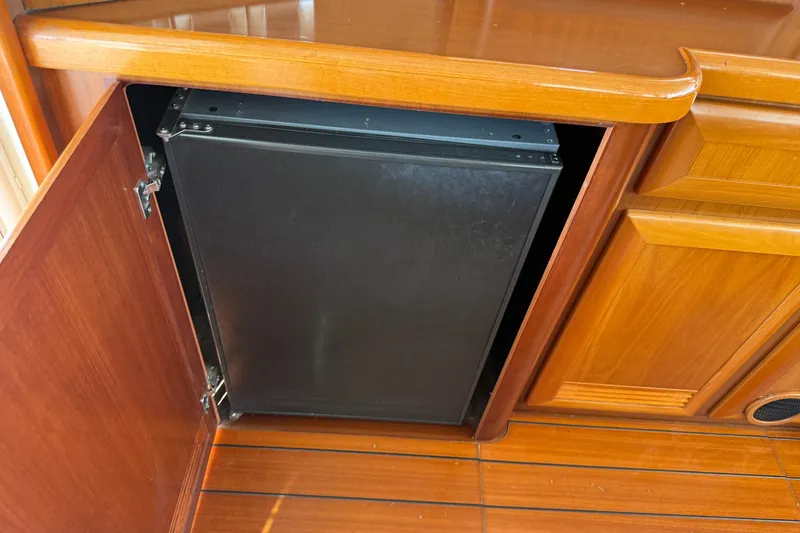 Slide: The Image of 2007 Beneteau Swift Trawler 42 interior cabinet with built-in appliance. - 46