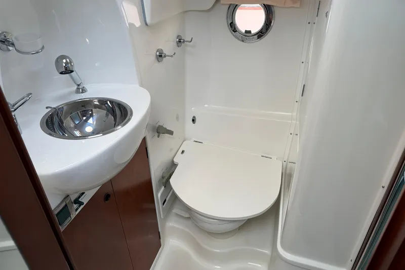 Slide: The Image of Compact bathroom in 2007 Beneteau Swift Trawler 42 with sink and toilet. - 72