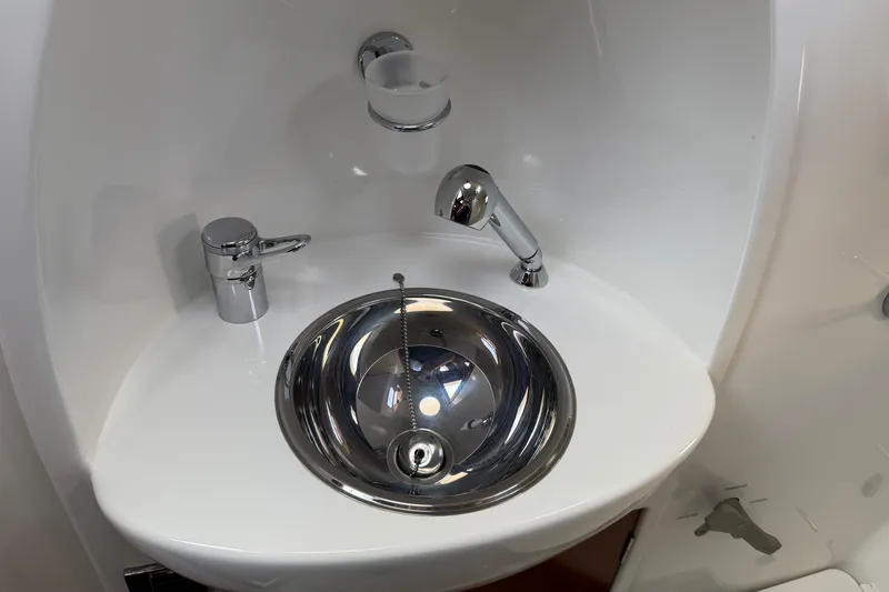 Slide: The Image of Stainless steel sink in 2007 Beneteau Swift Trawler 42 bathroom. - 73