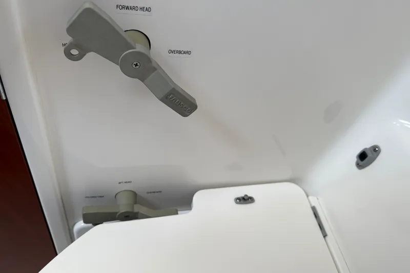 Slide: The Image of Control panel on 2007 Beneteau Swift Trawler 42, featuring labeled levers and switches. - 75