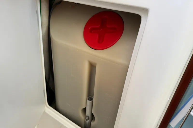 Slide: The Image of Red-capped tank in 2007 Beneteau Swift Trawler 42, interior view. - 76