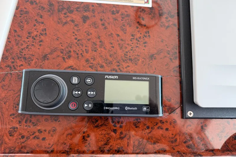 Slide: The Image of Fusion MS-RA70NSX stereo system on 2007 Beneteau Swift Trawler 42 dashboard. - 81