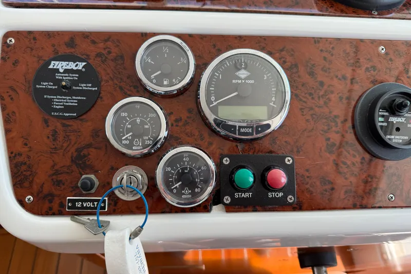 Slide: The Image of Control panel of a 2007 Beneteau Swift Trawler 42 with gauges and ignition. - 83