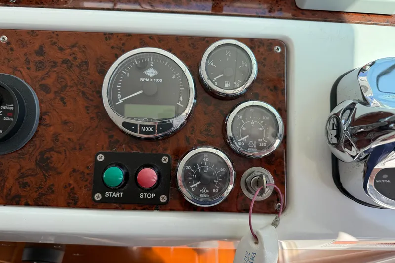 Slide: The Image of Dashboard of a 2007 Beneteau Swift Trawler 42 with gauges and controls. - 84