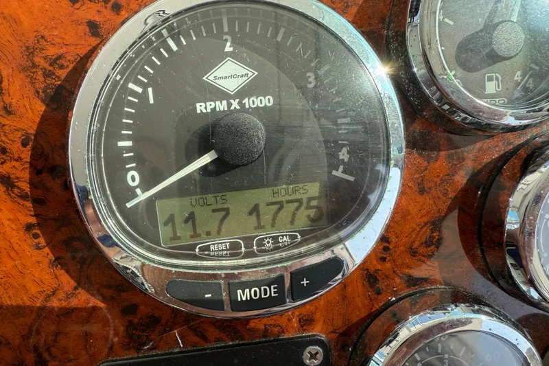 Slide: The Image of Close-up of Beneteau Swift Trawler 42 gauge panel, displaying RPM, volts, and hours. - 96