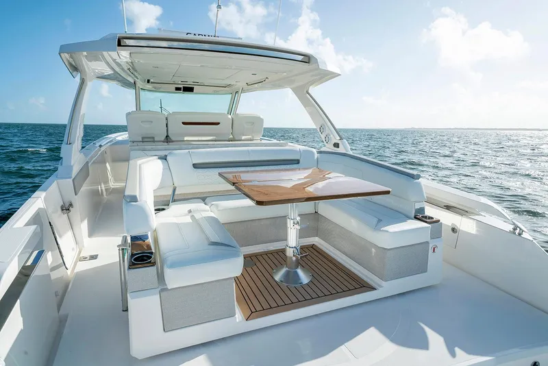 Slide: The Image of Manufacturer Provided Image: 2023 Tiara Yachts 43 LS luxury boat with spacious seating and ocean view. - 16