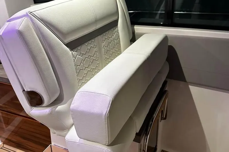 Slide: The Image of Luxurious seating on 2023 Tiara Yachts 43 LS, featuring elegant white upholstery. - 20