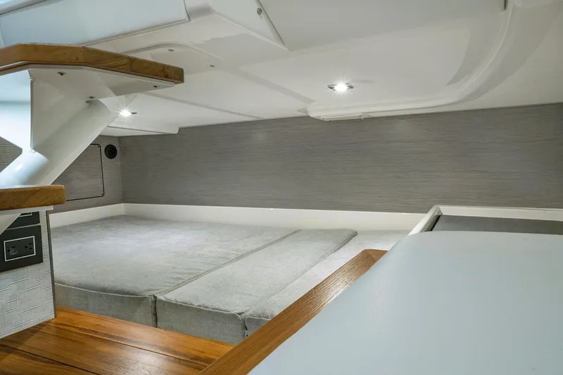Slide: The Image of Manufacturer Provided Image: 2023 Tiara Yachts 43 LS interior cabin with modern design and comfortable bedding. - 8