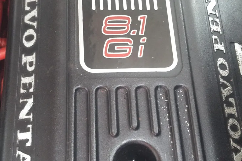 Slide: The Image of Volvo Penta 8.1 Gi engine cover on a 2008 Cobalt 323 boat. - 15