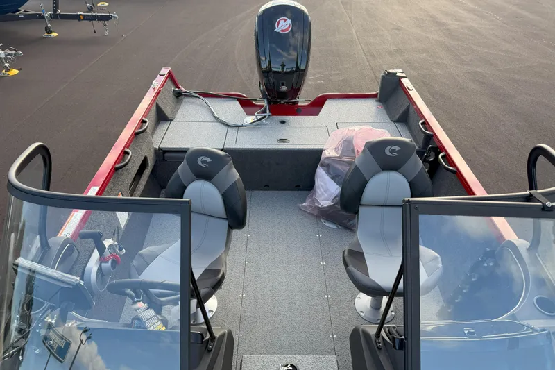 Slide: The Image of 2026 Crestliner 1750 HAWK WT boat interior with dual seats and motor. - 11