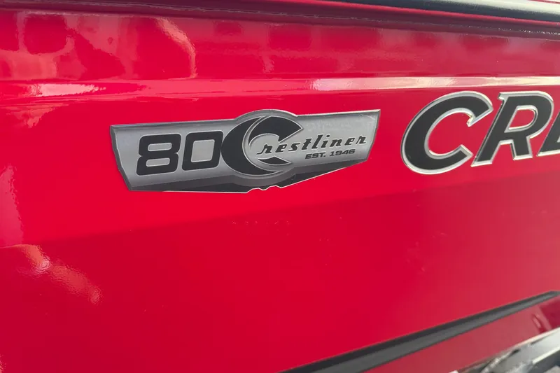 Slide: The Image of Red Crestliner 1750 HAWK WT boat with 80th anniversary emblem, 2026 model. - 13