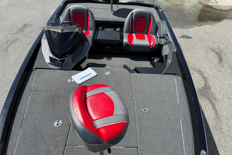 Slide: The Image of 2021 Ranger Z518 boat interior with red and gray seating, Lowrance equipment visible. - 9