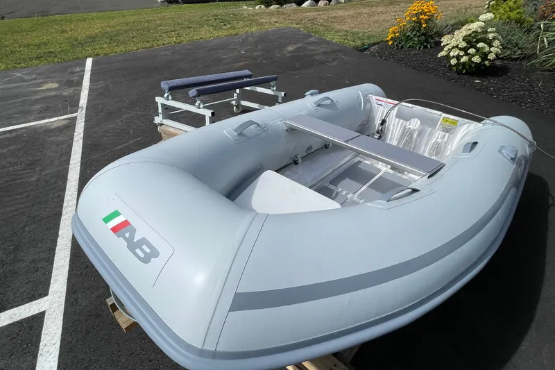 Slide: The Image of 2025 AB Inflatables Lammina 8 AL inflatable boat on display outdoors. - 7