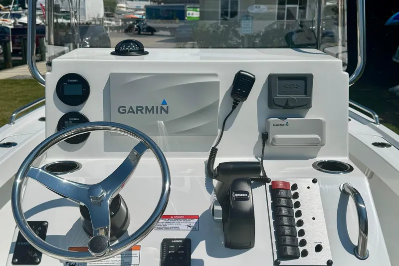 Slide: The Image of Center console of 2026 Parker 18SE boat with Garmin navigation system and Yamaha controls. - 8