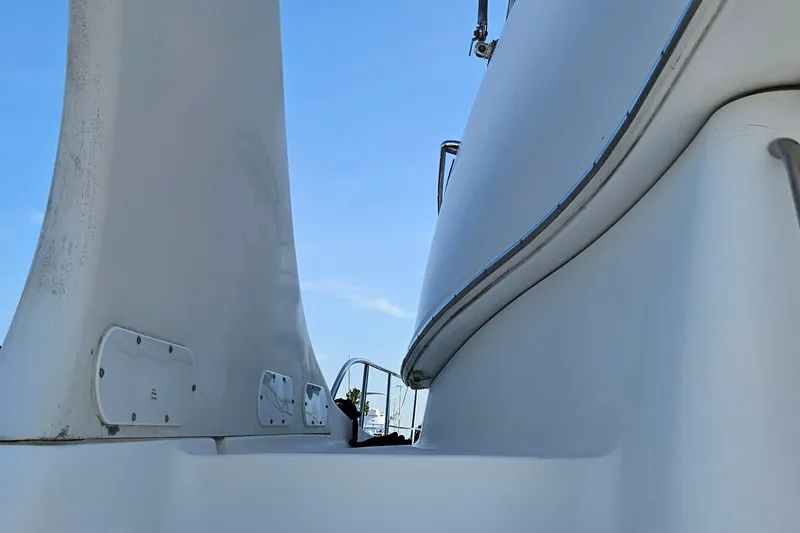 Slide: The Image of 2002 Carver 410 Sport Sedan yacht detail against blue sky. - 12