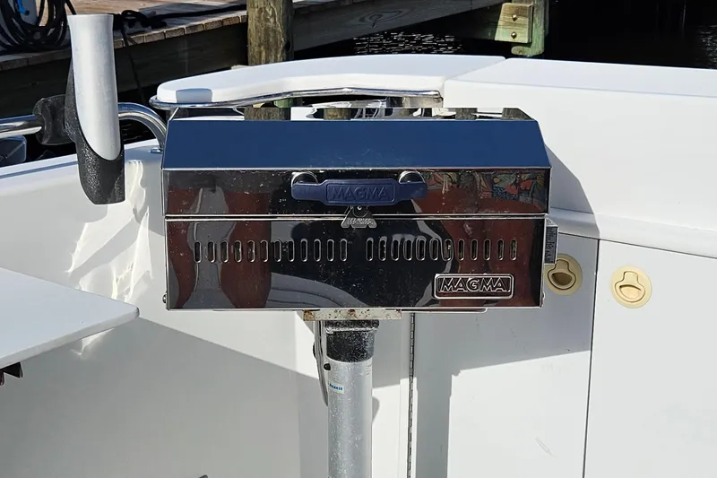 Slide: The Image of Stainless steel Magma grill on 2002 Carver 410 Sport Sedan boat deck. - 28