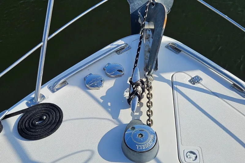 Slide: The Image of Bow of 2002 Carver 410 Sport Sedan with anchor and winch system. - 29