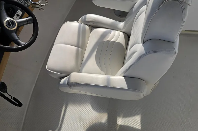 Slide: The Image of Captain's chair and steering wheel on 2002 Carver 410 Sport Sedan yacht. - 3