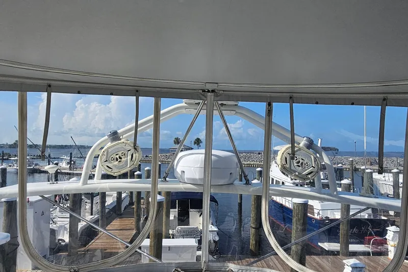 Slide: The Image of View from 2002 Carver 410 Sport Sedan yacht, overlooking marina with clear skies. - 37