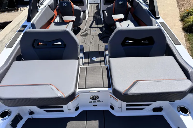 Slide: The Image of 2026 Scarab 235 LX Wake boat interior with stylish seating and modern design. - 10