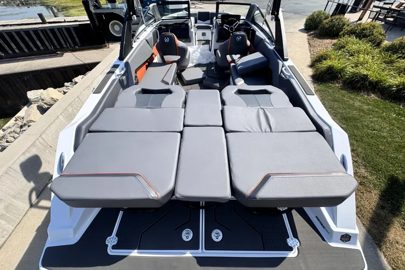 Slide: The Image of 2026 Scarab 235 LX Wake boat with spacious seating and modern design. - 11